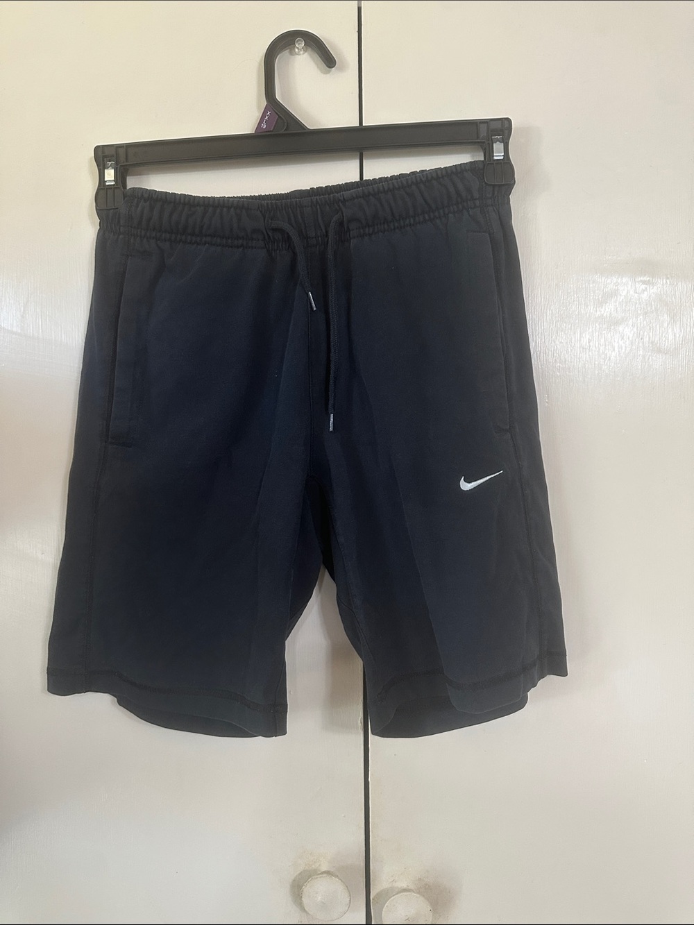 Nike Black Athletic Shorts with White Swoosh Accent